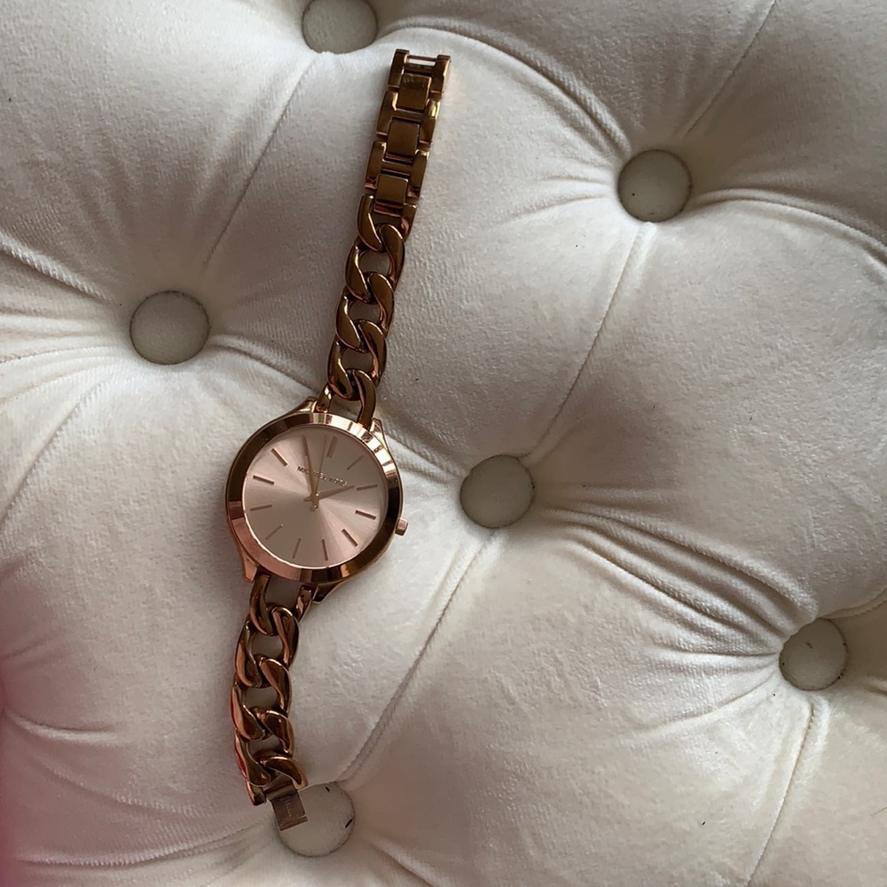 Rose gold Michael Kors bracelet watch.